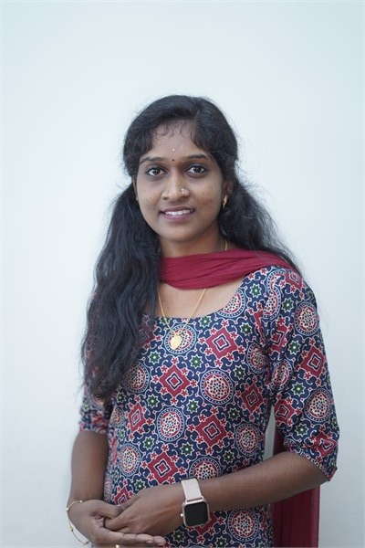 Nisha K